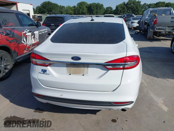 2018 Ford Fusion S z VIN 3FA6P0G76JR109403, wystawiony jako IAAI lot #42231625 z przebiegiem 109 018 mil mil oraz . Historia ofert i sprzedaży dostępna na DreamBid. Obrazek 16.