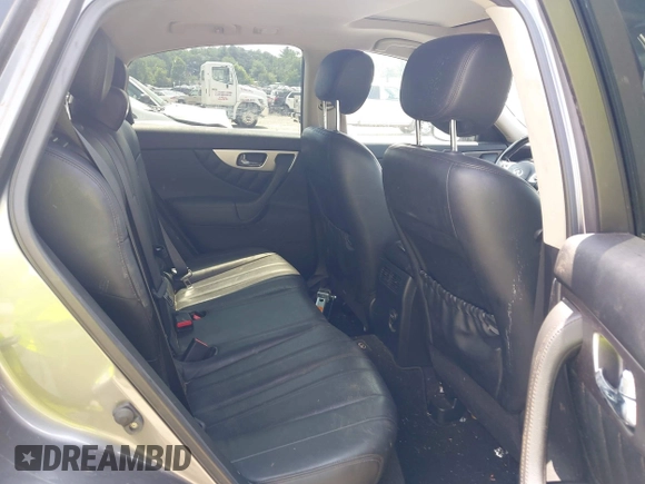 2014 Infiniti QX70 with VIN JN8CS1MW5EM411653, listed as a IAAI auction lot 42690935 with 110,806 mi miles and . Bid and sale history available at DreamBid. Image 8.