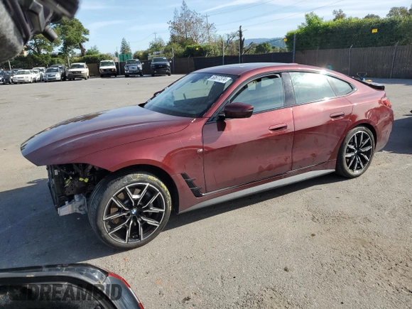 2022 BMW i4 eDrive40 with VIN WBY73AW05NFN05084, listed as a Copart auction lot 50677374 with 30,609 mi miles. Bid and sale history available at carsss.com. Image 1.