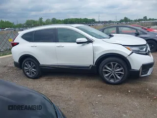 2021 Honda CR-V Touring with VIN 5J6RW2H93ML012016, listed as a IAAI auction lot 42365715 with 55,114 mi miles and . Bid and sale history available at DreamBid. Image 13.