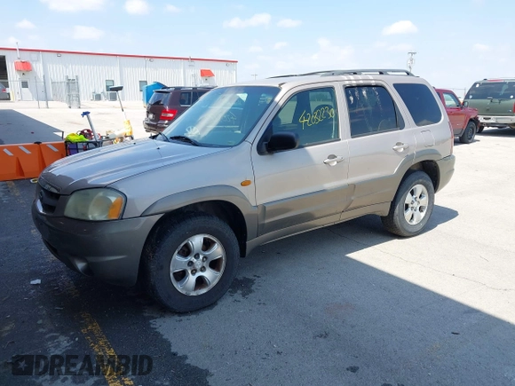 2002 Mazda Tribute LX with VIN 4F2YU08132KM26681, listed as a IAAI auction lot 42032230 with 273,155 mi miles and . Bid and sale history available at DreamBid. Image 2.