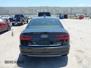 2016 Audi A6 Premium Plus with VIN WAUGFAFC0GN166596, listed as a IAAI auction lot 42526292 with 106,584 mi miles and . Bid and sale history available at DreamBid. Image 16.