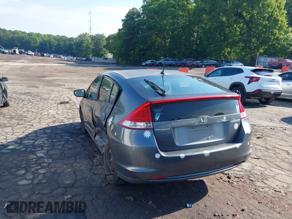 2010 Honda Insight LX with VIN JHMZE2H52AS032697, listed as a IAAI auction lot 42255794 with 262,251 mi miles and . Bid and sale history available at DreamBid. Image 3.