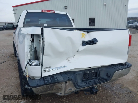 2013 Toyota Tundra z VIN 5TFRM5F19DX064236, wystawiony jako IAAI lot #41701170 z przebiegiem 147 312 mil mil oraz . Historia ofert i sprzedaży dostępna na DreamBid. Obrazek 17.