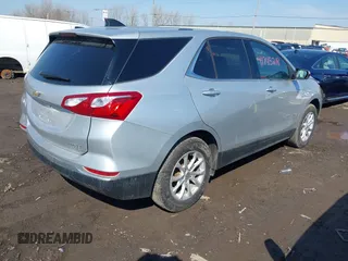 2019 Chevrolet Equinox LT with VIN 3GNAXUEV5KS670478, listed as a IAAI auction lot 41745218 with 56,996 mi miles and . Bid and sale history available at DreamBid. Image 4.