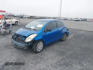 2011 Toyota Yaris with VIN JTDJT4K38B5329013, listed as a IAAI auction lot 41492239 with 200,180 mi miles. Bid and sale history available at carsss.com. Image 2.