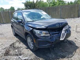 2017 Volkswagen Tiguan S z VIN WVGAV7AX3HK043141, wystawiony jako IAAI lot #42259813 z przebiegiem 63 151 mil mil oraz . Historia ofert i sprzedaży dostępna na DreamBid. Obrazek 1.