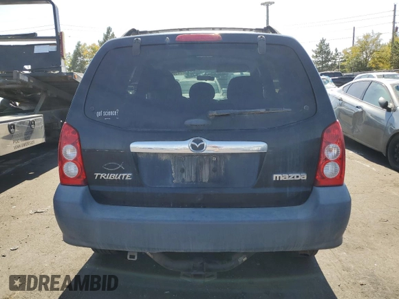 2006 Mazda Tribute i with VIN 4F2YZ02Z16KM36535, listed as a Copart auction lot 74566474 with 254,105 mi miles and Clean Title. Bid and sale history available at carsss.com. Image 6.