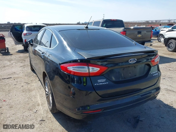 2014 Ford Fusion Titanium Hybrid with VIN 3FA6P0RU9ER111834, listed as a IAAI auction lot 41570337 with 121,099 mi miles. Bid and sale history available at carsss.com. Image 3.