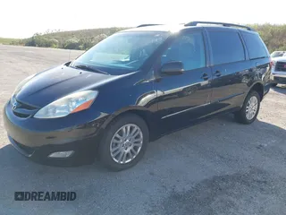 2009 Toyota Sienna XLE with VIN 5TDZK22C59S235573, listed as a IAAI auction lot 40885143 with 62,949 mi miles. Bid and sale history available at carsss.com. Image 2.