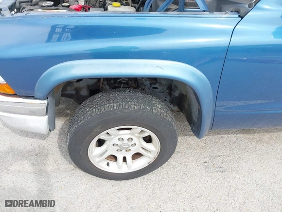 2004 Dodge Dakota SLT with VIN 1D7HG48NX4S585546, listed as a IAAI auction lot 41836690 with 191,735 mi miles. Bid and sale history available at carsss.com. Image 12.