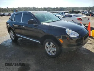 2004 Porsche Cayenne S with VIN WP1AB29P54LA69344, listed as a Copart auction lot 77030654 with 248,249 mi miles and Salvage Title. Bid and sale history available at carsss.com. Image 4.