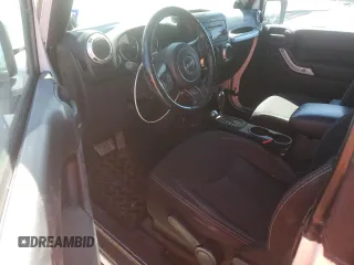 2014 Jeep Wrangler Sahara with VIN 1C4AJWBGXEL214269, listed as a Copart auction lot 47678045 with 283,634 mi miles and Clean Title. Bid and sale history available at DreamBid. Image 8.