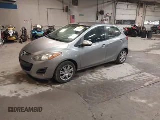 2012 Mazda 2 Sport with VIN JM1DE1KZ0C0149808, listed as a IAAI auction lot 42233078 with 166,111 mi miles and . Bid and sale history available at DreamBid. Image 2.