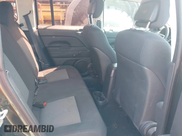 2010 Jeep Patriot Sport with VIN 1J4NT2GB8AD573538, listed as a IAAI auction lot 42113824 with 166,584 mi miles. Bid and sale history available at carsss.com. Image 8.