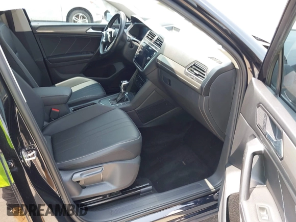 2023 Volkswagen Tiguan SE with VIN 3VVNB7AX5PM017938, listed as a IAAI auction lot 42453818 with 177,906 mi miles and . Bid and sale history available at DreamBid. Image 5.