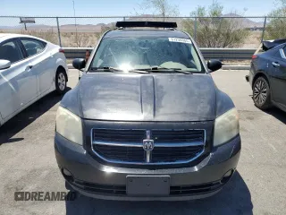 2007 Dodge Caliber R/T z VIN 1B3HE78K27D203611, wystawiony jako Copart lot #61256665 z przebiegiem 138 620 mil mil oraz Czysty tytuł • Clean title. Historia ofert i sprzedaży dostępna na DreamBid. Obrazek 5.