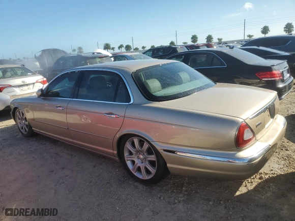 2005 Jaguar XJ with VIN SAJWA79C05SG46913, listed as a Copart auction lot 75092794 with 0 mi miles and Salvage Title. Bid and sale history available at carsss.com. Image 2.