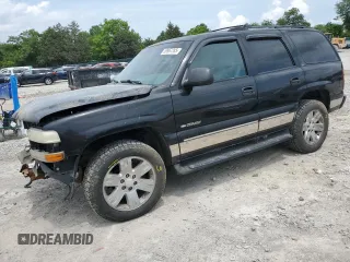 2001 Chevrolet Tahoe LS with VIN 1GNEK13T41R120108, listed as a Copart auction lot 59967285 with 240,533 mi miles and Salvage title. Bid and sale history available at DreamBid. Image 1.