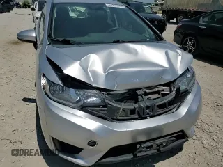 2015 Honda Fit LX z VIN 3HGGK5H52FM738587, wystawiony jako Copart lot #61231705 z przebiegiem 134 623 mil mil oraz Szkoda całkowita • Salvage title. Historia ofert i sprzedaży dostępna na DreamBid. Obrazek 13.