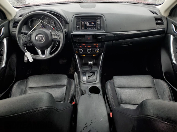 2014 Mazda CX-5 Grand Touring with VIN JM3KE4DY6E0309925, listed as a Copart auction lot 53521105 with 161,579 mi miles and Salvage Title. Bid and sale history available at carsss.com. Image 8.