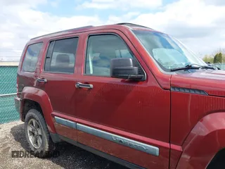 2008 Jeep Liberty Sport with VIN 1J8GN28K68W111462, listed as a IAAI auction lot 42012567 with 129,077 mi miles. Bid and sale history available at carsss.com. Image 14.