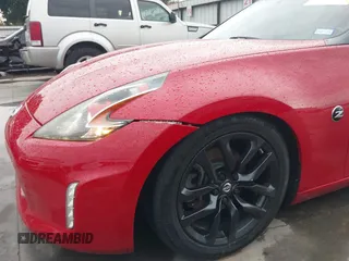2016 Nissan 370Z z VIN JN1AZ4EHXGM932681, wystawiony jako IAAI lot #42350850 z przebiegiem 94 586 mil mil oraz . Historia ofert i sprzedaży dostępna na DreamBid. Obrazek 6.