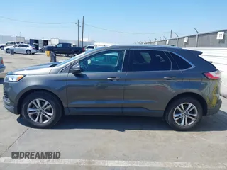 2019 Ford Edge SEL with VIN 2FMPK3J9XKBB76512, listed as a IAAI auction lot 42498683 with 119,513 mi miles and . Bid and sale history available at DreamBid. Image 14.