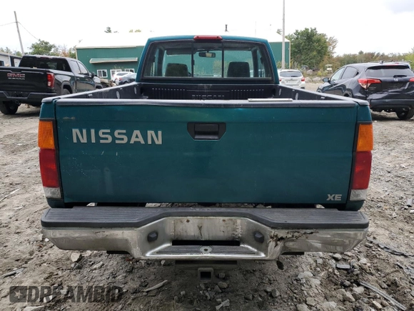 1997 Nissan Frontier XE with VIN 1N6SD16Y0VC329686, listed as a Copart auction lot 73103584 with 105,657 mi miles and Salvage title. Bid and sale history available at DreamBid. Image 6.