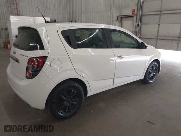 2012 Chevrolet Sonic LTZ z VIN 1G1JE6SH4C4169147, wystawiony jako IAAI lot #40283181 z przebiegiem 60 876 mil mil oraz . Historia ofert i sprzedaży dostępna na DreamBid. Obrazek 4.