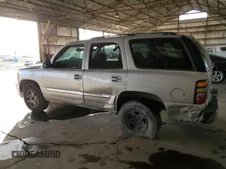 2004 GMC Yukon SLE with VIN 1GKEC13V04R253528, listed as a Copart auction lot 82235244 with 245,584 mi miles and Salvage Title. Bid and sale history available at carsss.com. Image 2.