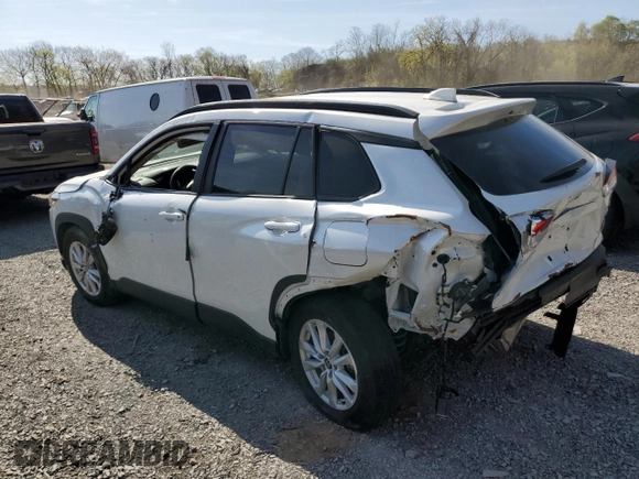 2022 Toyota Corolla Cross LE with VIN 7MUCAABG2NV024823, listed as a Copart auction lot 53458775 with 24,562 mi miles and Non repairable. Bid and sale history available at DreamBid. Image 2.