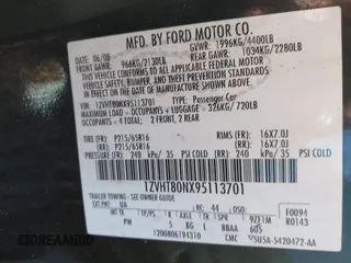 2009 Ford Mustang with VIN 1ZVHT80NX95113701, listed as a IAAI auction lot 42028558 with 100,224 mi miles and . Bid and sale history available at carsss.com. Image 7.
