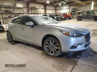 2018 Mazda 3 Touring with VIN 3MZBN1L37JM199419, listed as a Copart auction lot 48133745 with 84,279 mi miles and Salvage Title. Bid and sale history available at carsss.com. Image 4.