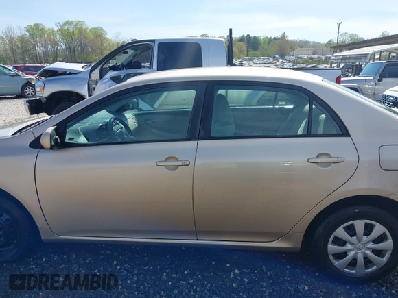 2011 Toyota Corolla L with VIN 2T1BU4EE1BC547635, listed as a IAAI auction lot 42053236 with 121,485 mi miles. Bid and sale history available at carsss.com. Image 14.