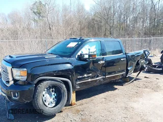 2019 GMC Sierra 2500HD Denali with VIN 1GT12SEY3KF207121, listed as a IAAI auction lot 38782753 with 87,337 mi miles. Bid and sale history available at carsss.com. Image 6.