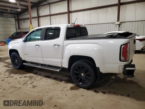 2018 GMC Canyon 4WD Denali z VIN 1GTG6EEN6J1171037, wystawiony jako Copart lot #52521865 z przebiegiem 99 931 mil mil oraz Szkoda całkowita • Salvage title. Historia ofert i sprzedaży dostępna na DreamBid. Obrazek 2.