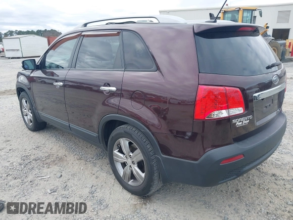 2013 Kia Sorento EX with VIN 5XYKU4A21DG312753, listed as a IAAI auction lot 41033124 with 197,459 mi miles and . Bid and sale history available at carsss.com. Image 3.