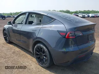 2021 Tesla Model Y Long Range z VIN 5YJYGDEE7MF140144, wystawiony jako IAAI lot #42350137 z przebiegiem Nie podano mil oraz . Historia ofert i sprzedaży dostępna na DreamBid. Obrazek 3.