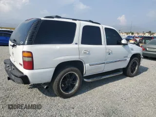 2001 GMC Yukon SLT z VIN 1GKEC13T51J117159, wystawiony jako Copart lot #55241255 z przebiegiem 209 440 mil mil oraz Szkoda całkowita • Salvage title. Historia ofert i sprzedaży dostępna na DreamBid. Obrazek 3.