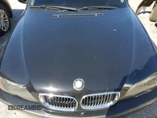 2004 BMW 3 Series 325i with VIN WBAET37424NJ42802, listed as a Copart auction lot 88778135 with 117,722 mi miles and Salvage Title. Bid and sale history available at carsss.com. Image 11.