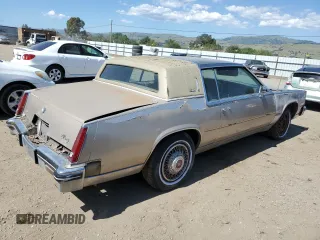 1985 Cadillac Eldorado z VIN 1G6EL578XFE661216, wystawiony jako Copart lot #54606984 z przebiegiem 12 462 mil mil oraz Szkody całkowita. Historia ofert i sprzedaży dostępna na DreamBid. Obrazek 3.