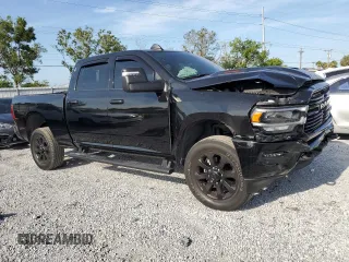 2024 Ram 2500 Laramie with VIN 3C6UR5FL7RG203778, listed as a Copart auction lot 58271405 with 32,057 mi miles and Salvage title. Bid and sale history available at DreamBid. Image 4.