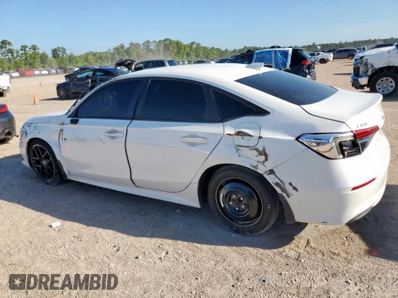 2023 Honda Civic Sport with VIN 2HGFE2F57PH511027, listed as a Copart auction lot 62703695 with 33,899 mi miles and Salvage title. Bid and sale history available at DreamBid. Image 2.