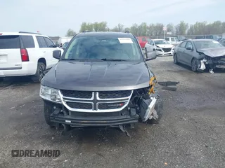 2017 Dodge Journey SXT with VIN 3C4PDDBG5HT618563, listed as a IAAI auction lot 42015188 with 104,747 mi miles and . Bid and sale history available at DreamBid. Image 12.
