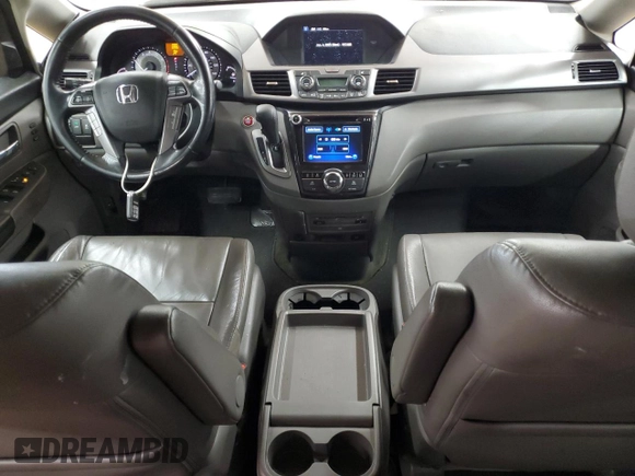 2015 Honda Odyssey Touring Elite with VIN 5FNRL5H99FB005576, listed as a Copart auction lot 58963215 with 167,967 mi miles and Salvage title. Bid and sale history available at DreamBid. Image 8.