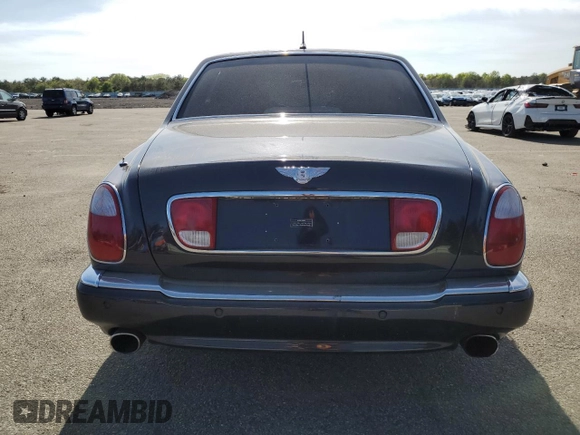 2005 Bentley Arnage R с VIN SCBLC37F15CX10517, выставлен на аукционе Copart как лот 54303364 с пробегом 116 865 миль миль и Списание • Salvage title. История ставок и продаж доступна на DreamBid. Изображение 6.