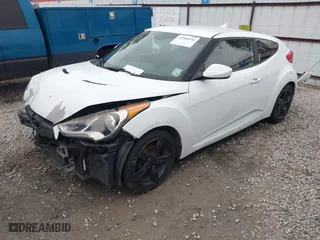 2014 Hyundai Veloster with VIN KMHTC6AD7EU217470, listed as a IAAI auction lot 41286296 with 150,034 mi miles. Bid and sale history available at carsss.com. Image 18.