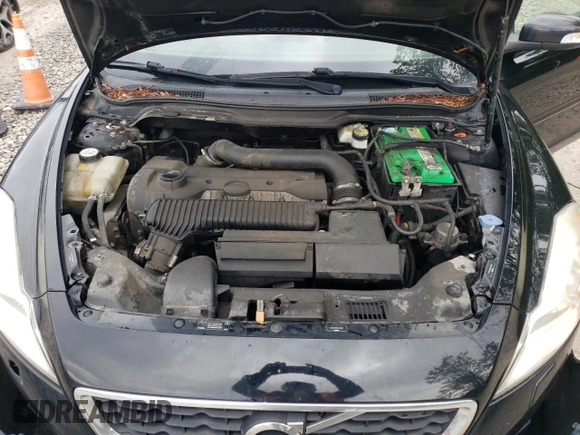 2011 Volvo C70 z VIN YV1672MC3BJ119321, wystawiony jako Copart lot #58251285 z przebiegiem 166 931 mil mil oraz Szkoda całkowita • Salvage title. Historia ofert i sprzedaży dostępna na DreamBid. Obrazek 11.