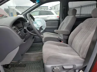 1999 Toyota Sienna CE z VIN 4T3GF19C7XU154663, wystawiony jako Copart lot #85240854 z przebiegiem 197 962 mil mil oraz Szkoda całkowita • Salvage title. Historia ofert i sprzedaży dostępna na DreamBid. Obrazek 7.